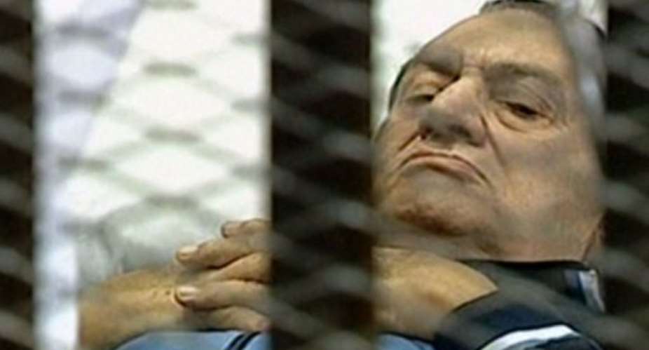Mubarak's lawyer claims he has stomach cancer and went into a coma last month.  By - AFPEGYPTIAN TVFile