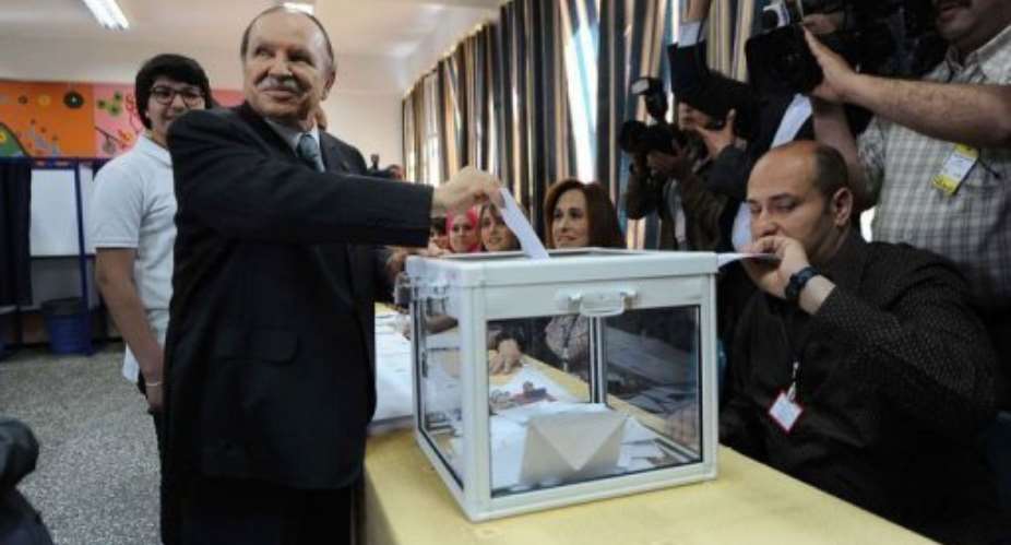 Algeria's President Abdelaziz Bouteflika casts his vote.  By  AFP