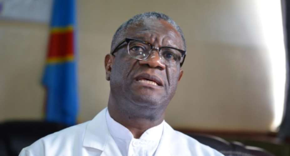 Nobel Peace Prize winner Denis Mukwege urged the ICC to keep on investigations in the DRCongo.  By Alain WANDIMOYI AFP