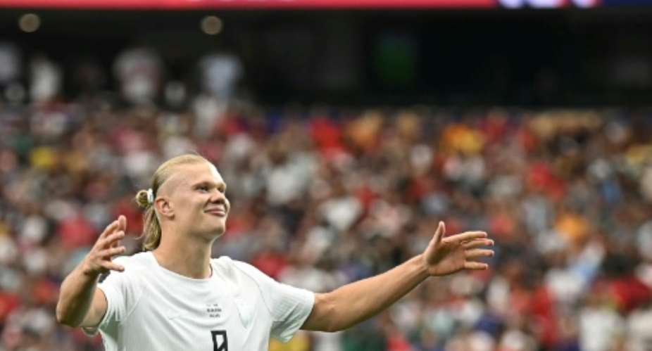 Norways Erling Haaland celebrates scoring his teams winner in a 2-1 victory over Ivory Coast.  By Paul ELLIS (AFP)