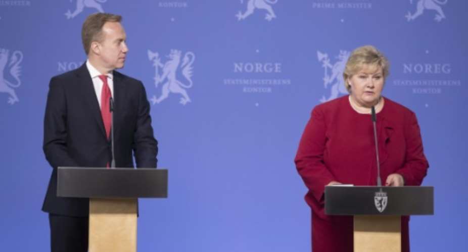 Norways Prime Minister Erna Solberg R and Foreign Minister Borge Brende attend a press conference in Oslo on May 17, 2017, after the release of Norwegian-British citizen Joshua French from a Congo prison.  By Terje Pedersen NTB ScanpixAFP