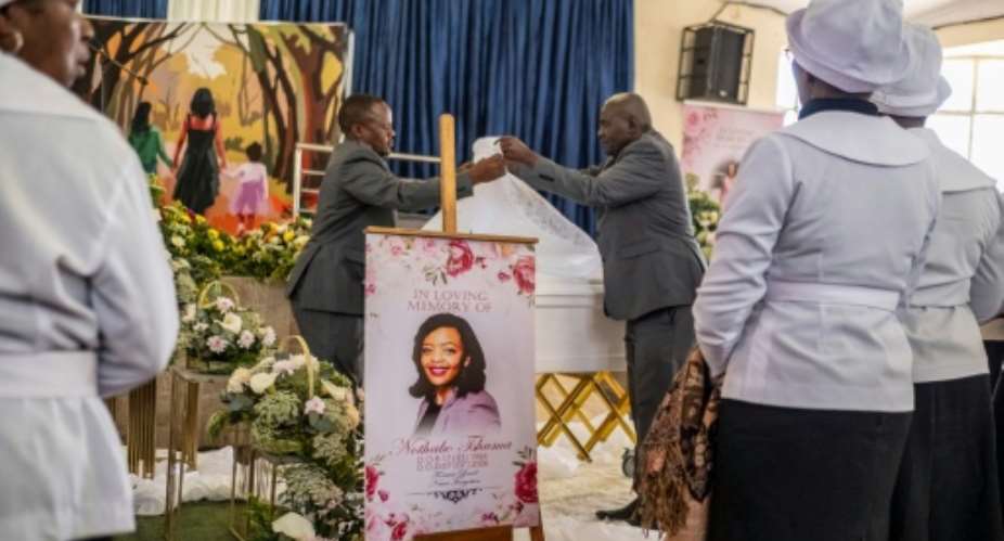Nothabo Zandile Tshuma and her two daughters were killed in Britain in early July.  By Zinyange Auntony (AFP)