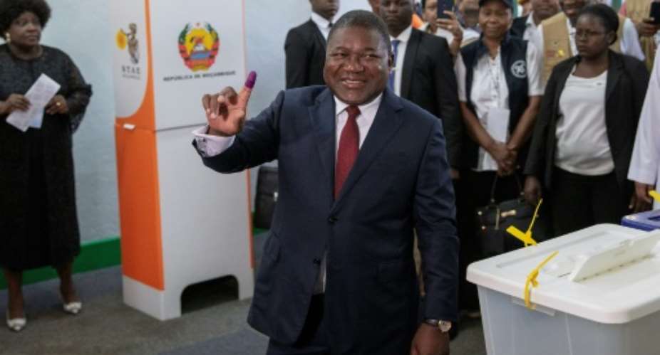 Nyusi is forecast to win a second five-year termdespite his popularity taking a hit from chronic unrest and a financial crisis linked to alleged state corruption.  By GIANLUIGI GUERCIA AFP