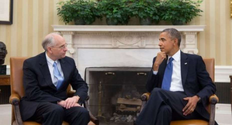US President Barack Obama (R) meets with Donald Booth in the Oval Office on August 28, 2013.  By Pete Souza (The White House/AFP)