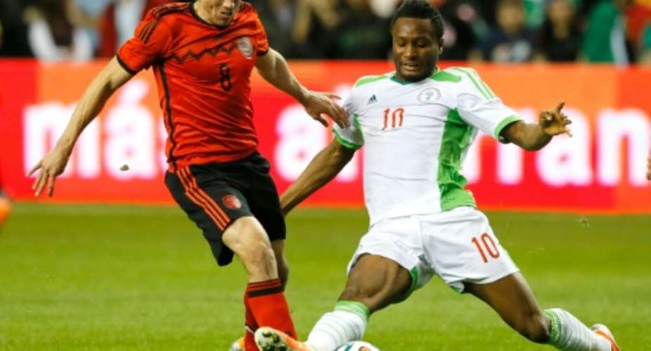 Obi Mikel R, pictured March 2014 won his first Africa Cup winners' medal in South Africa in 2013, after finishing third in 2006 and 2010.  By Kevin C. Cox GETTY IMAGES NORTH AMERICAAFPFile