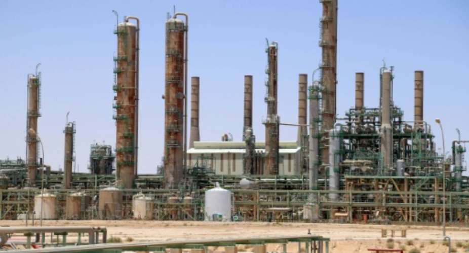 Oil refinery in Libya's northern town of Ras Lanuf.  By - AFP