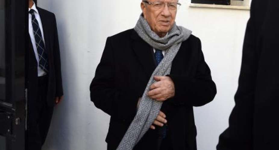 Veteran politician Beji Caid Essebsi, who has claimed victory in Tunisia's first free presidential election, arrives at his party's headquarters on December 22, 2014 in Tunis.  By Fethi Belaid AFPFile