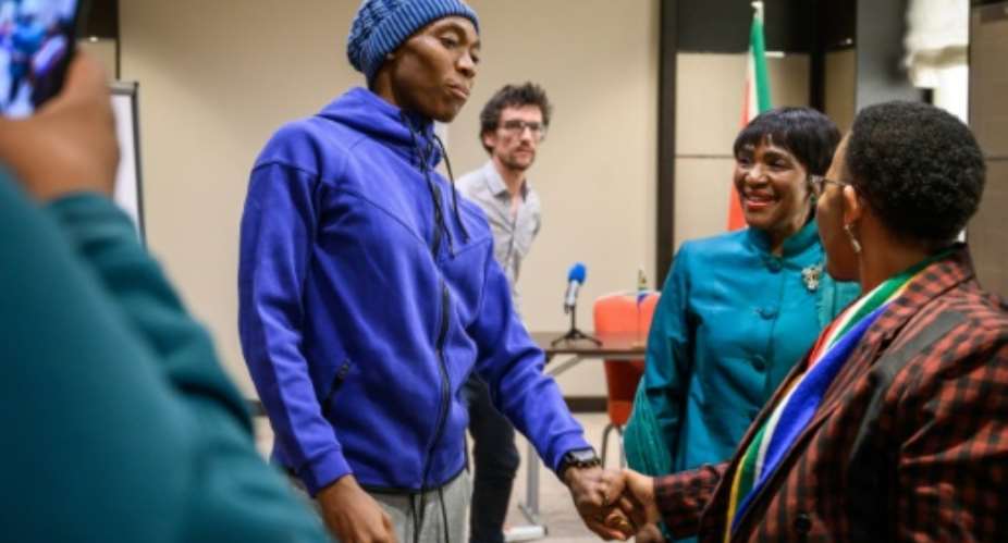 Olympic champion Caster Semenya meets South Africa's Sports Minister Tokozile Xasa and South Africa's ambassador to the United Nations in Geneva, Nozipho Joyce Mxakato-Diseko.  By Fabrice COFFRINI AFPFile