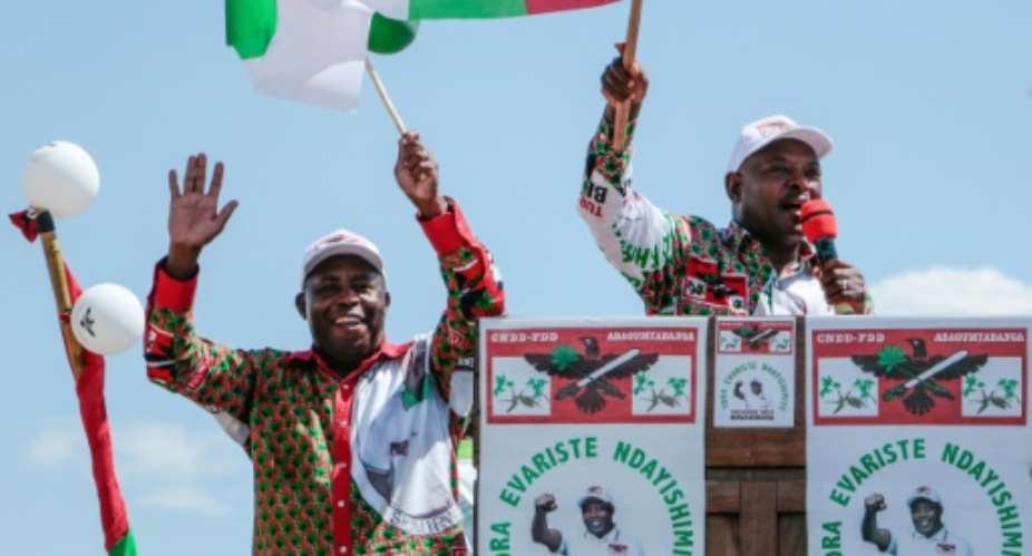 On the campaign trail: Pierre Nkurunziza, right, with his successor Evariste Ndayishimiye at an election rally on May 16.  By - (AFP)