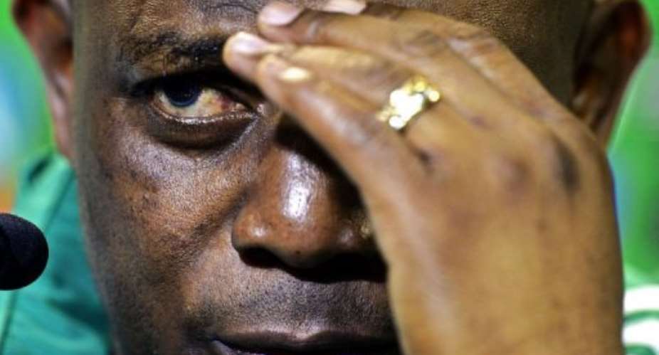 Nigerias coach Stephen Keshi listens to questions during a press conference in Salvador on June 19, 2013.  By Daniel Garcia (AFP)