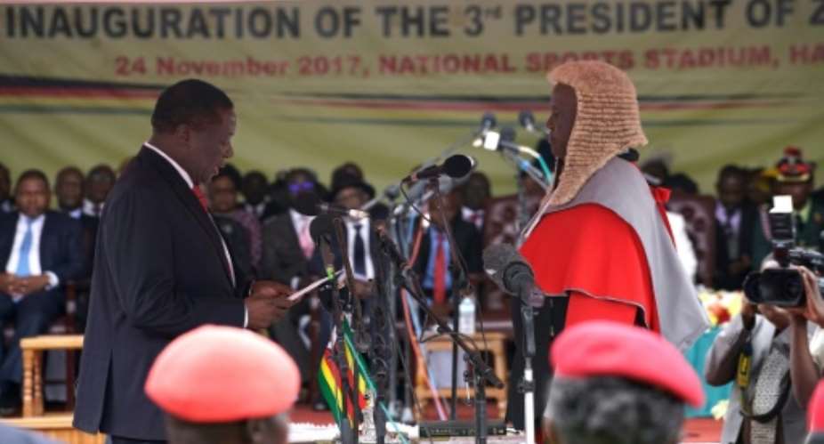 Once one of Robert Mugabe's closest allies, Emmerson Mnangagwa officially became Zimbabwe's new president at an inauguration ceremony in Harare.  By Marco Longari AFP