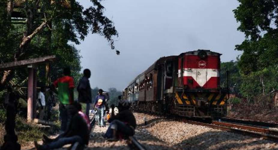 File photo shows a train approaching Muanza station on the Sena Line, some 100 kms north of Beira, Mozambique on November 3, 2010.  By Gianluigi Guercia AFPFile