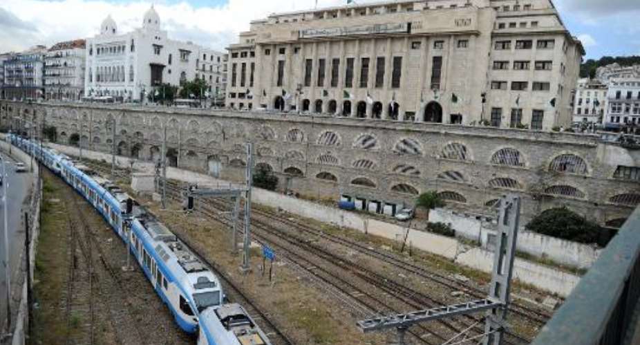 A general view shows Algeria's National Assembly parliament building behind a train track in the capital Algiers on September 3, 2012.  By Farouk Batiche AFPFile