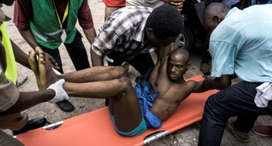 One man was shot and injured in Kinshasa during a protest called by the Catholic Church, later dying of his injuries.  By John WESSELS AFP