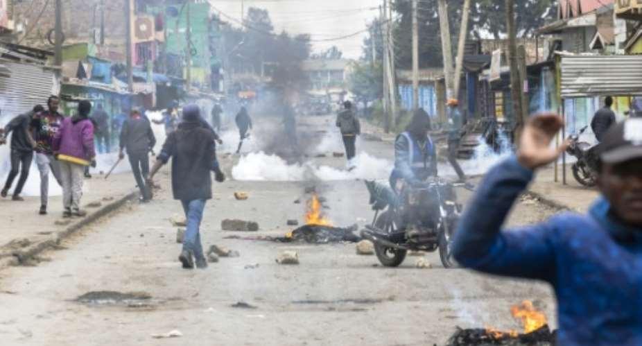 One person was killed and two others were wounded after protests over the alleged abduction of two activists erupted in a Nairobi informal settlement.  By Tony KARUMBA (AFP)