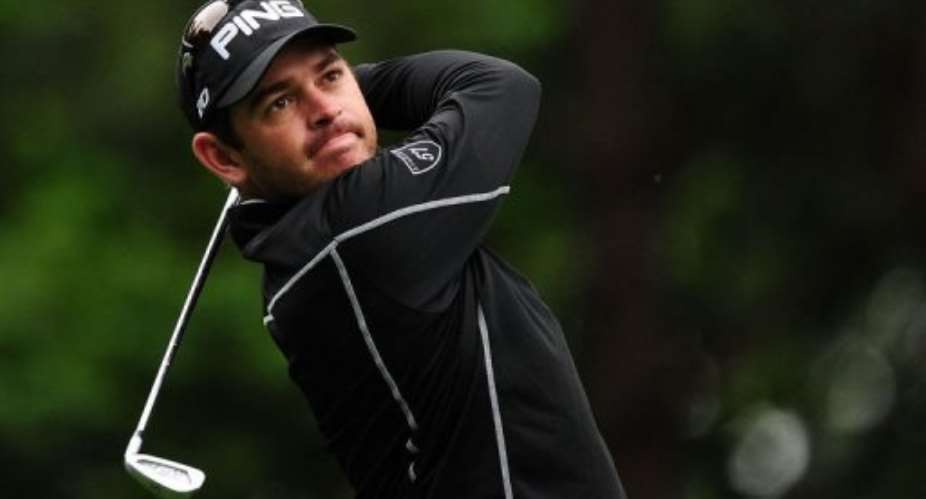 Louis Oosthuizen of South Africa tees off on the fourth hole.  By Robyn Beck AFP