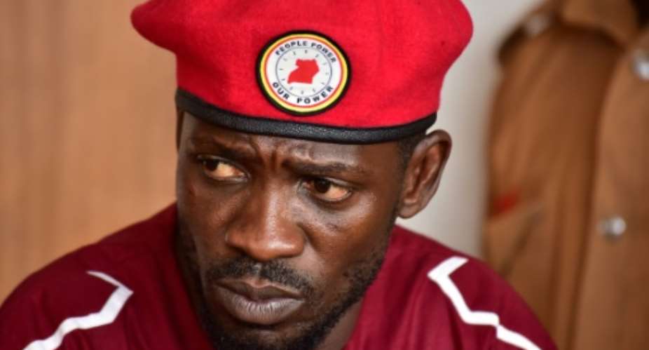 Opposition figurehead Bobi Wine was arrested for staging an illegal protest in 2018 -- charges fellow opposition MPs decried as ridiculous.  By Nicholas BAMULANZEKI AFPFile