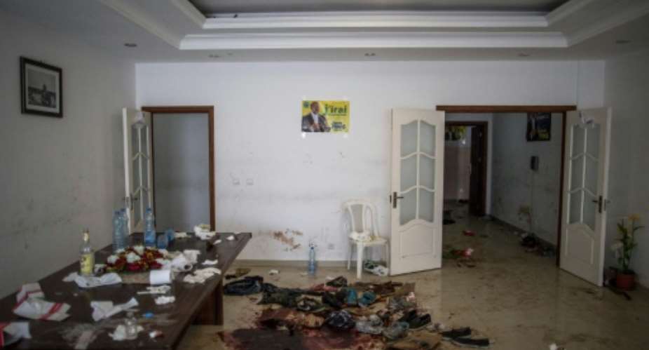 Opposition leader Jean Ping's headquarters were attacked after the vote.  By MARCO LONGARI AFPFile