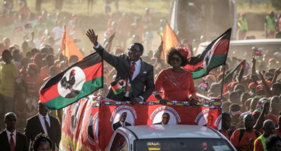 Opposition Malawi Congress Party MCP leader and presidential candidate Lazarus Chakwera L held his last campaign rally in Lilongwe.  By GIANLUIGI GUERCIA AFP