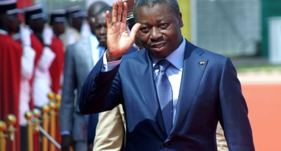 Opposition stalwart Gilchrist Olympio wants President Gnassingbe, pictured, to accept a return to the 1992 constitution, which sets a 10-year limit for presidents, and therefore to refrain from standing in 2020.  By EMILE KOUTON AFPFile