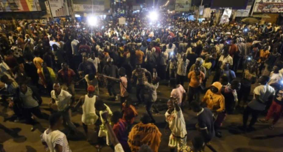 Opposition supporters kept an all-night vigil as they demanded constitutional reform during anti-government protests on September 7 -- but now the ruling party says it will respond with counter marches of its own.  By PIUS UTOMI EKPEI AFPFile
