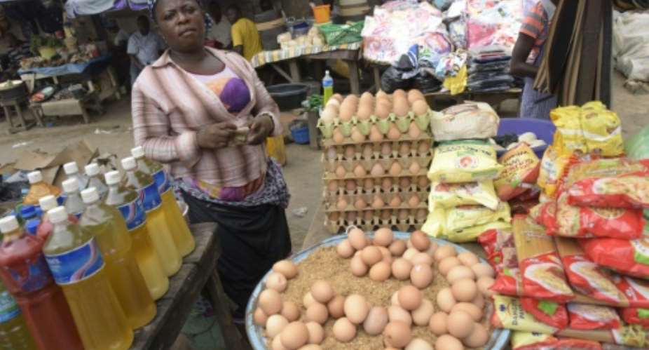 Ordinary Nigerians are feeling the full effects of spiralling inflation.  By Pius Utomi Ekpei AFPFile