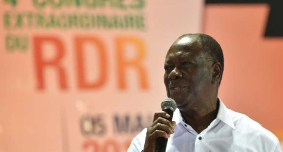 Ouattara is under fire for suggesting that constitutional changes allow him to stay in office beyond 2020 when his second term expires.  By SIA KAMBOU AFP