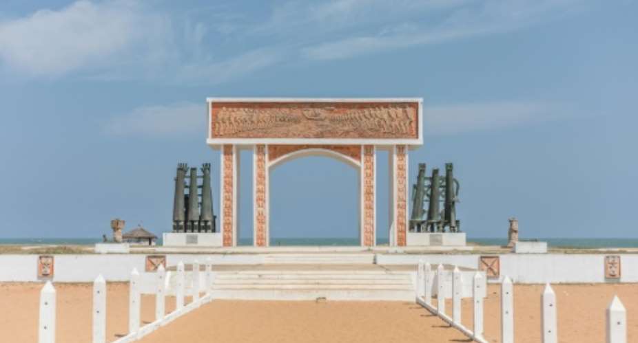 Ouidah is scattered with memorials to the slave trade like the The door of no return where slaves departed on ships.  By Yanick Folly (AFP)