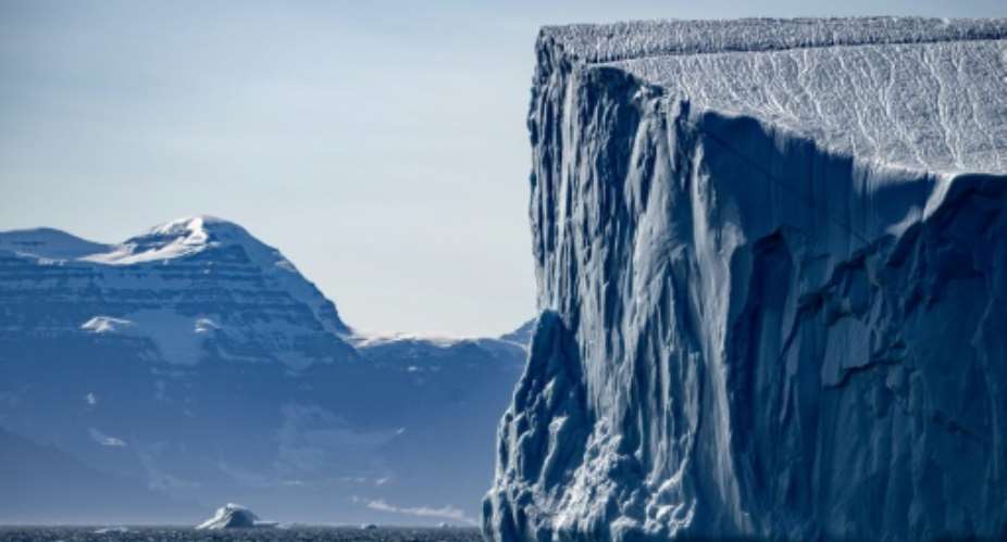 Over the edge? The melting Greenland  and West Antarctic icesheets are of Earth's two tipping points teetering on the point of no return, the report warned.  By Olivier MORIN AFPFile
