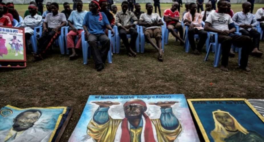 Paintings of Ne Muanda Nsemi were put on display at police headquarters in Kinshasa in 2017.  By JOHN WESSELS (AFP/File)