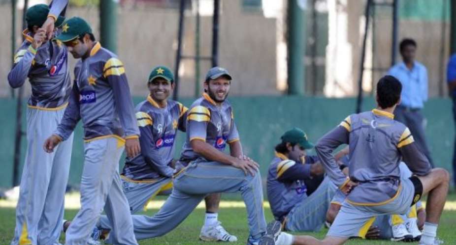 Pakistan cricketers stretch during an ICC Twenty20 Cricket World Cup practise session in Colombo on October 3, 2012.  By Lakruwan Wanniarachchi (AFP/File)