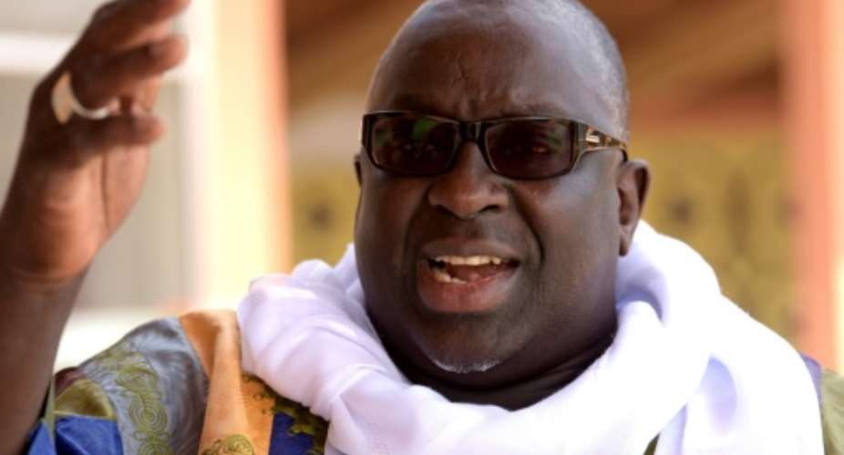 Papa Massata Diack, son of former president of the International Association of Athletics Federations Lamine Diack, speaks during an exclusive interview with AFP on March 6, 2017 in Dakar.  By SEYLLOU (AFP)