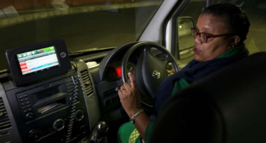 Paramedic Patricia September and her colleagues have to take their lives in their hands on duty in gang-ridden parts of Cape Town, where they need a police escort.  By RODGER BOSCH AFP