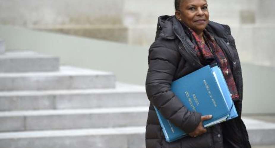French Justice minister Christiane Taubira leaves the Elysee Palace in Paris after a weekly cabinet meeting, on January 28, 2015.  By Martin Bureau AFPFile