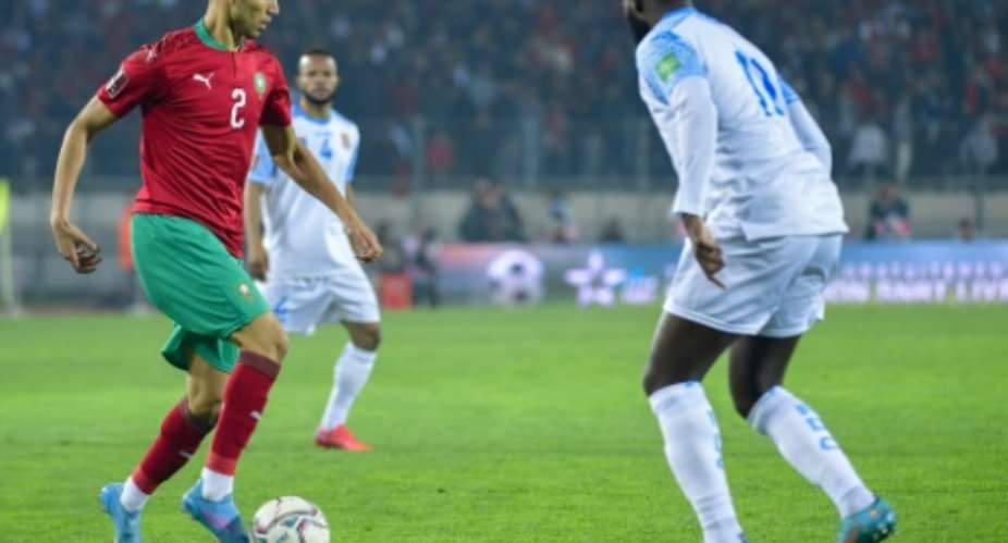 Paris Saint-Germain defender Achraf Hakimi L playing for Morocco against the Democratic Republic of Congo in a World Cup play-off in Casablanca.  By - AFP