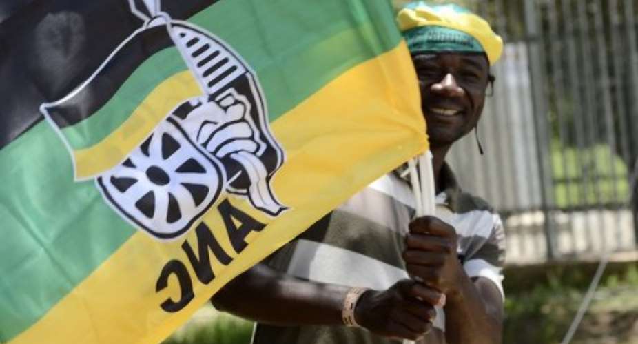 A street vendor sells ANC flags outside the 53rd National Conference of the (ANC) in Bloemfontein on December 19, 2012.  By Stephane de Sakutin (AFP/File)