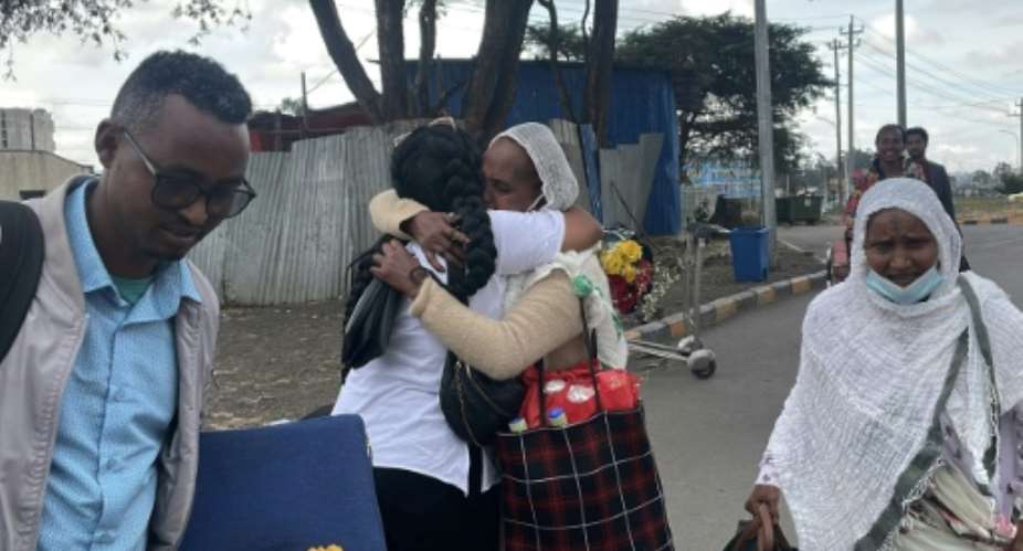 Passengers arriving from Tigray are greeted by relatives at the Bole International Airport in Addis Ababa on December 28, 2022 as flights resumed under a peace deal.  By - AFPFile