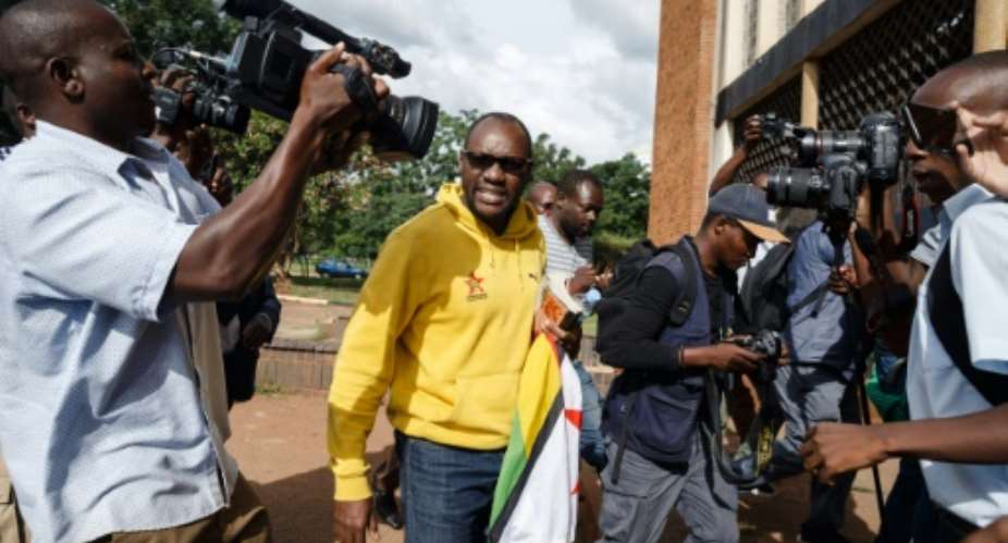 Pastor Evan Mawarire, shown here arriving at the Harare Magistrates Court, became a prominent voice during protests in 2016 when he posted videos on social media criticising the government.  By Jekesai NJIKIZANA AFP