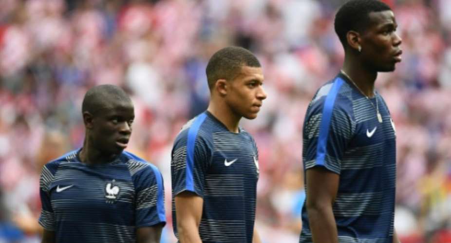 Paul Pogba, Kylian Mbappe and N'Golo Kante are among players on the World Cup-winning French team that have African roots.  By Jewel SAMAD AFP
