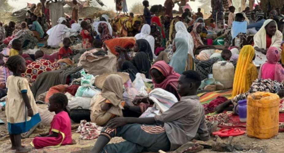 People who fled Zamzam camp rest in a field near Tawila in war-torn Sudans western Darfur region.  By - (AFP)