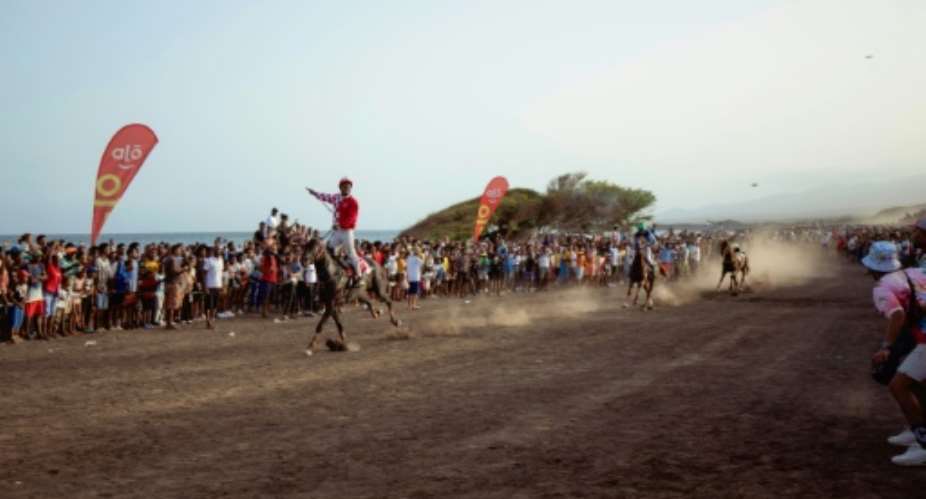 Phizer and his mount Keke won the eagerly anticipated Sonjon horse race to close the annual festivities.  By QUEILA FERNANDES (AFP)