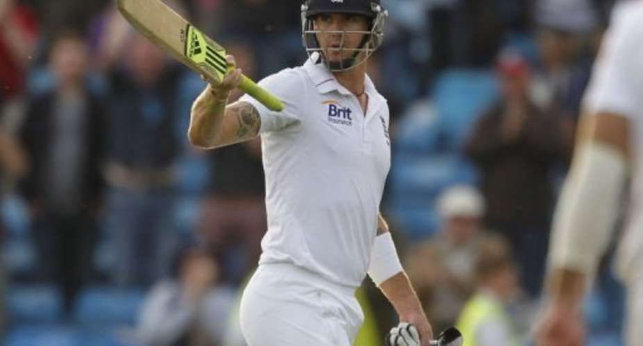 England's Kevin Pietersen acknowledges the crowd after the close of play.  By Ian Kington AFP