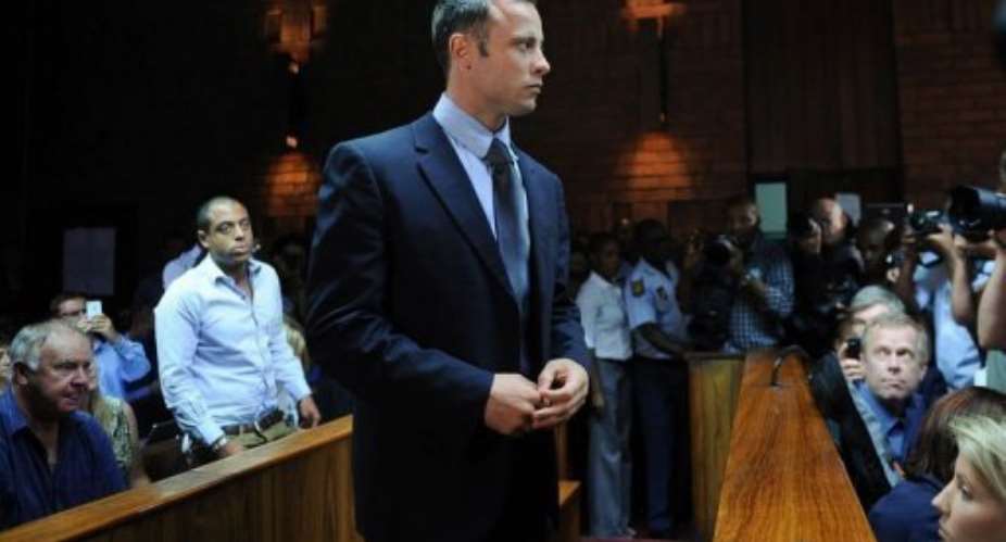 South African Olympic sprinter Oscar Pistorius appears at the Magistrate Court in Pretoria on February 22, 2013.  By Alexander Joe AFP