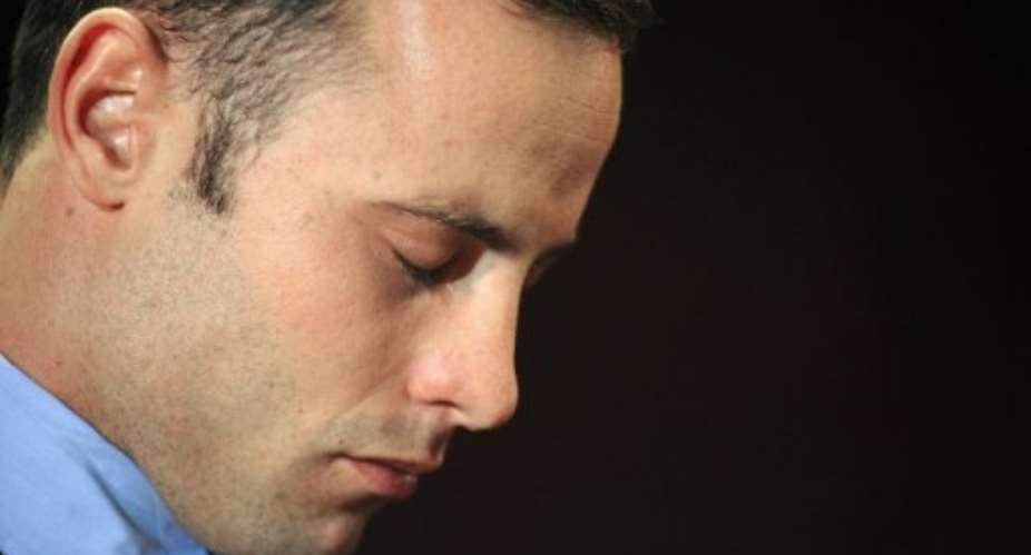 South African Olympic sprinter Oscar Pistorius is pictured at the Magistrate Court in Pretoria on February 22, 2013.  By Alexander Joe AFPFile