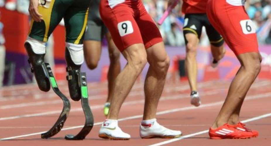 Pistorius runs on specially constructed carbon fibre blades.  By Olivier Morin (AFP)
