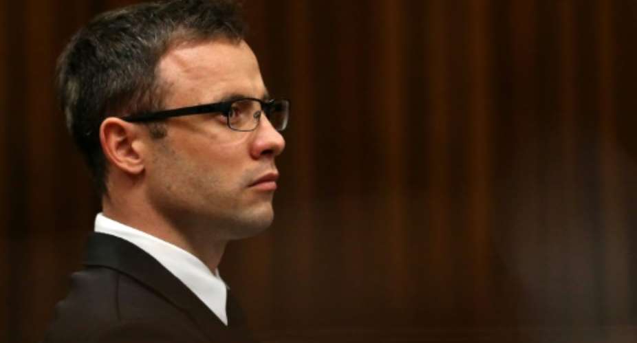 South African paralympic athlete Oscar Pistorius was sentenced last year to five years in prison for killing model and law graduate Reeva Steenkamp on Valentine's Day 2013.  By Siphiwe Sibeko POOLAFPFile