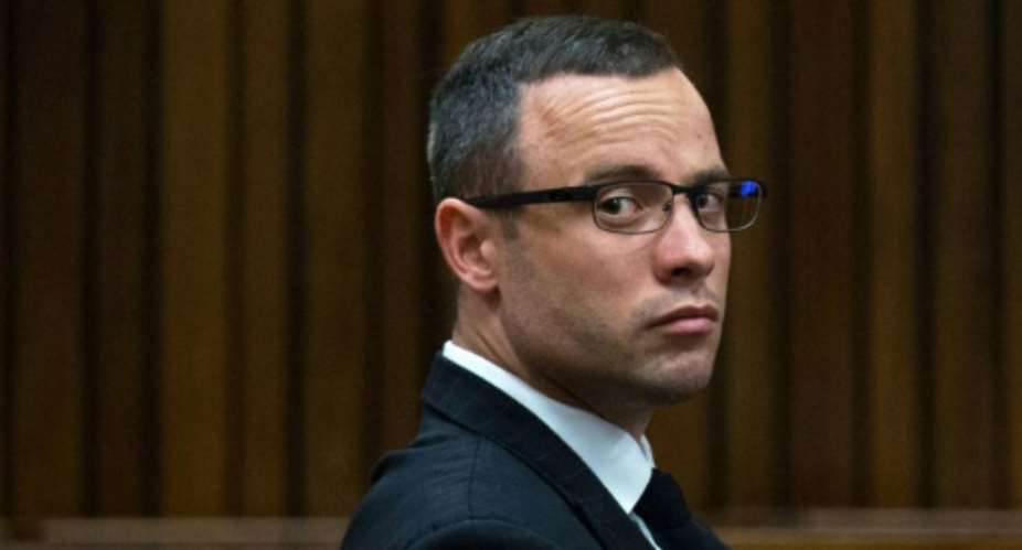 Oscar Pistorius looking on during his trial at the high court in Pretoria on May 13, 2014.  By Daniel Born PoolAFPFile