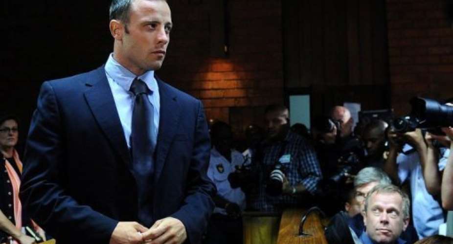 Oscar Pistorius appears at court in Pretoria on February 22, 2013.  By Alexander Joe AFP