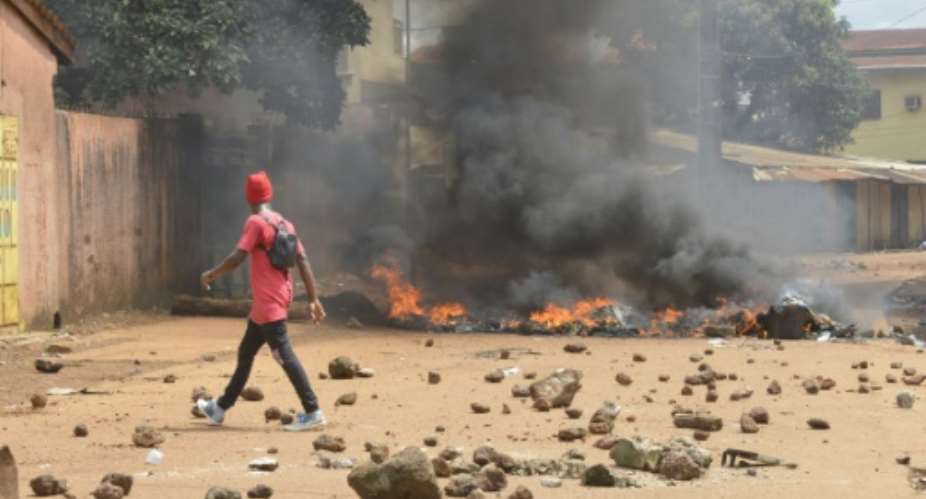 Pockets of violence have erupted around the outer districts of Conakry, with hundreds of police clashing with demonstrators.  By CELLOU BINANI AFP