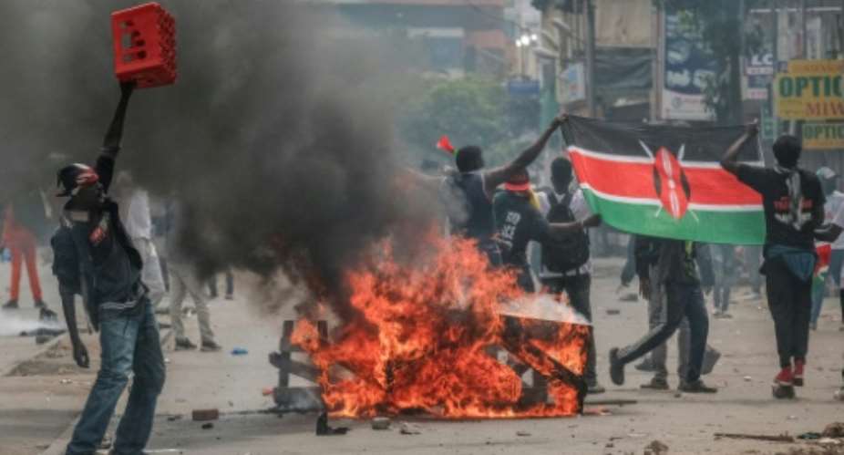Police and protesters clashed in the Kenyan capital, with some demonstrators detained.  By KABIR DHANJI (AFP)